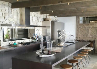 Interior painting work done by CB Paint and Decor in a luxury kitchen in Santa Barbara, including cabinet refinishing.